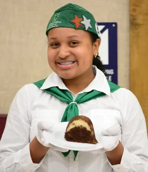 Celeste Harrison with her prize-winning chocoflan. (Photo by Kathy Keatley Garvey)
