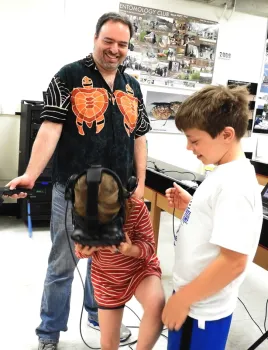 Kamila Ehrlich, 6, delights in what she's seeing in