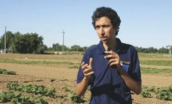 UC Davis assistant professor Mohsen Mesgaran says researchers are trying to predict the timing of germination of broomrape, to better control the weed with herbicides. (photo Bob Johnson)