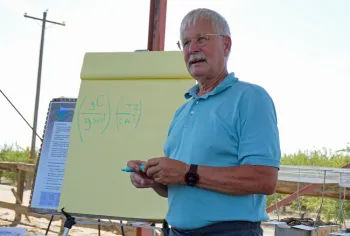 UCCE specialist Jeff Mitchell presents soil emission equation.