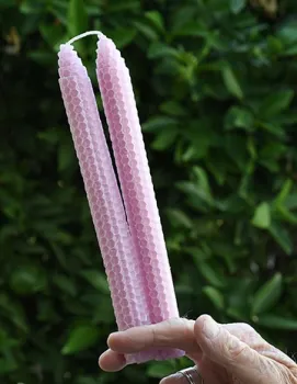 Beeswax candles are the joint effort of honey bees (which make the wax) and crafters (who make the candles. (Photo by Kathy Keatley Garvey)