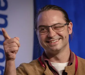 Doctoral candidate Brendon Boudinot smiles as he answers a question at the 2018 Linnaean Games.
