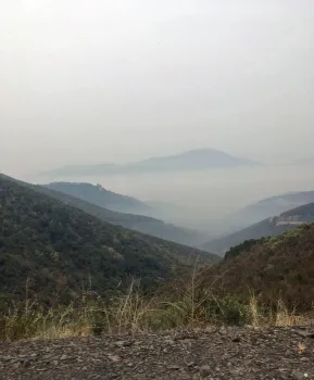 A smokey valley view from Priest Grade, looking down to town of Moccasin. (Photo: JoLynn Miller)