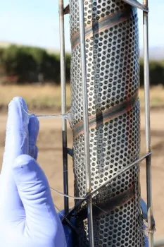 Figure 2. PAM cartridge with static mixing element. Note that after exposure to water the dry PAM becomes a viscous gel that coats the surface of the cartridge.