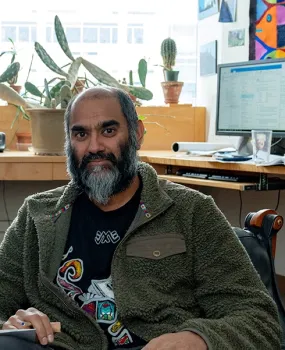 Professor Anurag Agrawal in his office at Cornell University. (Photo by David Burbank)