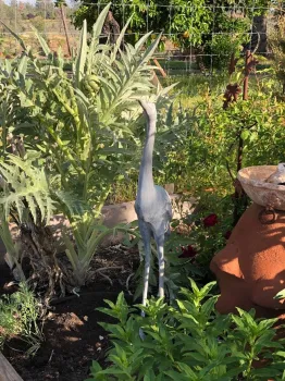 Yard art in a Paradise vegetable garden, Debi Durham