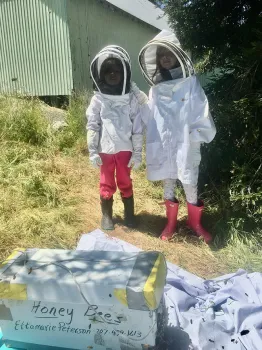 Beekeepers and sisters, Sofia (left) and Annabelle are enrolled in Ettamarie Peterson's Liberty 4-H Club beekeeping project in Petaluma. Sofia is a second-year beekeeper, and Annabelle, a third-year. (Photo by Ettamarie Peterson)