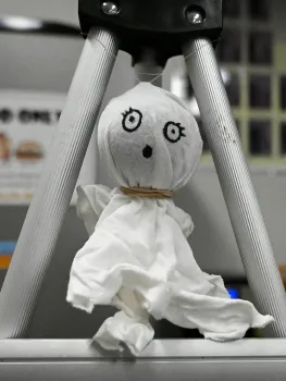 A gall ghost, made from an oak gall, reigns over the Bohart Museum of Entomology's family craft table. (Photo by Kathy Keatley Garvey)