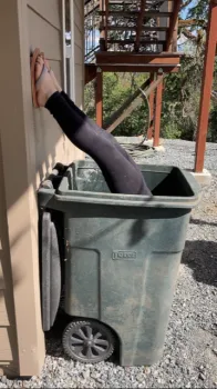 4-h youth look into their trash bin