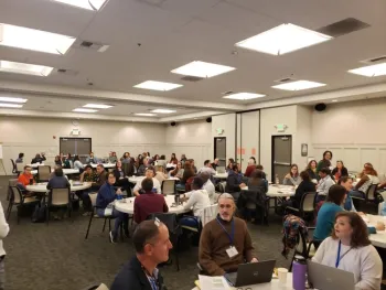 8 to 10 people at each round tables.