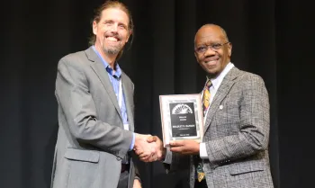 Brad Hanson, left, with Andre Lucas Simoes Araujo