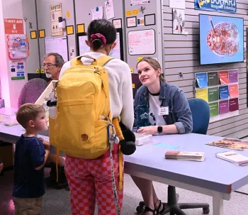 Attendees at the Bohart Museum open house asked such questions as