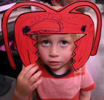Evan Sarnat, 3, displays his creation. His father, myrmecologist Eli Sarnat is a UC Davis doctoral alumnus who studied with Professor Phil Ward. (Photo by Kathy Keatley Garvey)