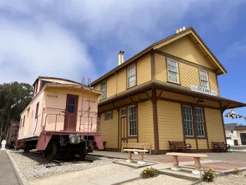Oceano Train Depot- A bright yellow, historic building