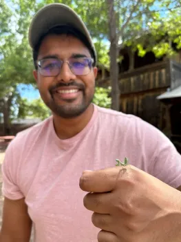 Lohit Garikipati with a praying mantis