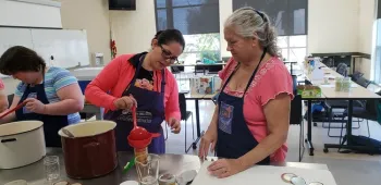 Master Food Preservers teaching a class on canning.