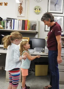 UC Davis distinguished professor Lynn Kimsey, director of the Bohart Museum of Entomology, answers questions about insects at a UC Davis Biodiversity Museum Day. (Photo by Kathy Keatley Garvey)