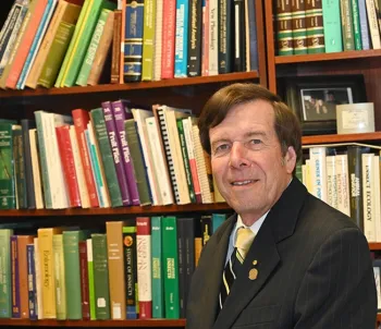 UC Davis distinguished professor Frank Zalom in his library. (Photo by Kathy Keatley Garvey)