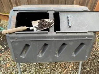 Photo of a compost bin on a stand
