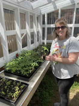 Paula Conlee, gardener and greenhouse volunteer at The Garden at St. Timothy's. Grace Mahannah
