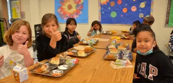Cabrillo Elementary students giving their approval of school lunches on reusables May 2023.