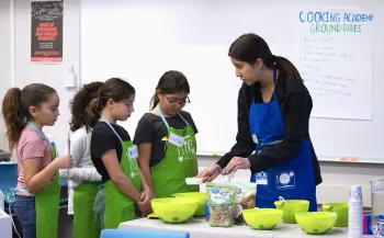 CalFresh Youth Academy staff leading a classroom activity with children