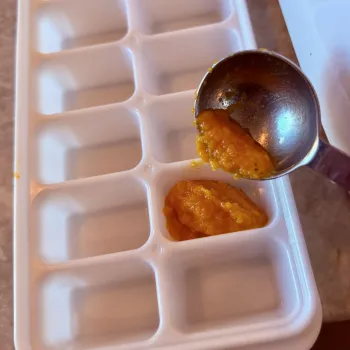 Aji Amarillo paste being loaded in ice cube tray