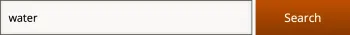 Screenshot of a grey text box on the left side and an orange clickable button on the right side. The grey text box has text in it that says, “water.” The orange clickable button has text in it that says, “Search.”