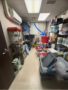 Storeroom with lots of bins and miscellaneous items