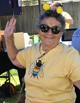 Amina Harris, "queen bee" of The Hive, waves to the crowd at the 2025 California Honey Festival.