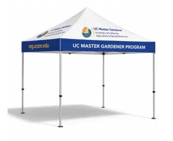 Pop up tent branded with the UC Master Gardener logo.
