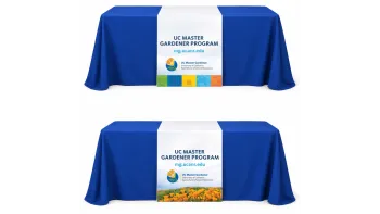 Two UC Master Gardener Program table runners displayed on blue tablecloths, showing the program name, mg.ucanr.edu, and UC Master Gardener logo.