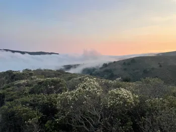 fog rolling in over hills