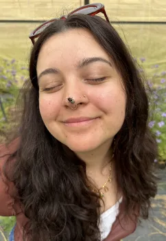 UC Davis doctoral candidate Alexia "Lexie" Martin with Osmia