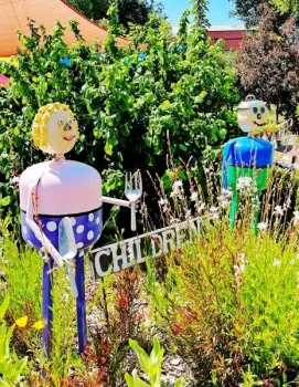 Garden welcomes and celebrates children with whimsical artwork placed amongst plants
