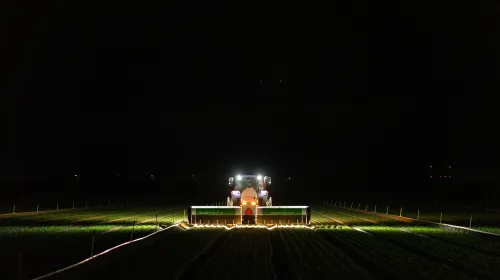 AI-powered precision application aims individual micro-shots at weeds or crops during nighttime