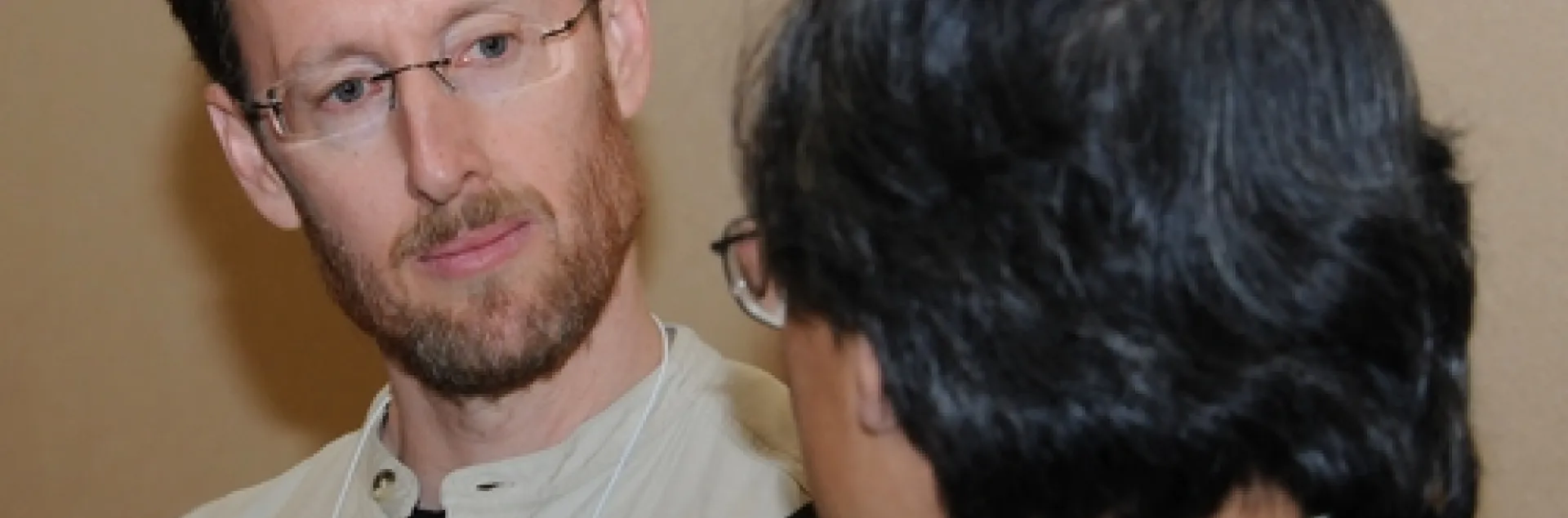 JAY ROSENHEIM, shown here talking to a colleague at a meeting of the Entomological Society of America, is a newly elected Fellow of the American Association for the Advancement of Science. He joined the UC Davis Department of Entomology faculty in 1990. (Photo by Kathy Keatley Garvey)