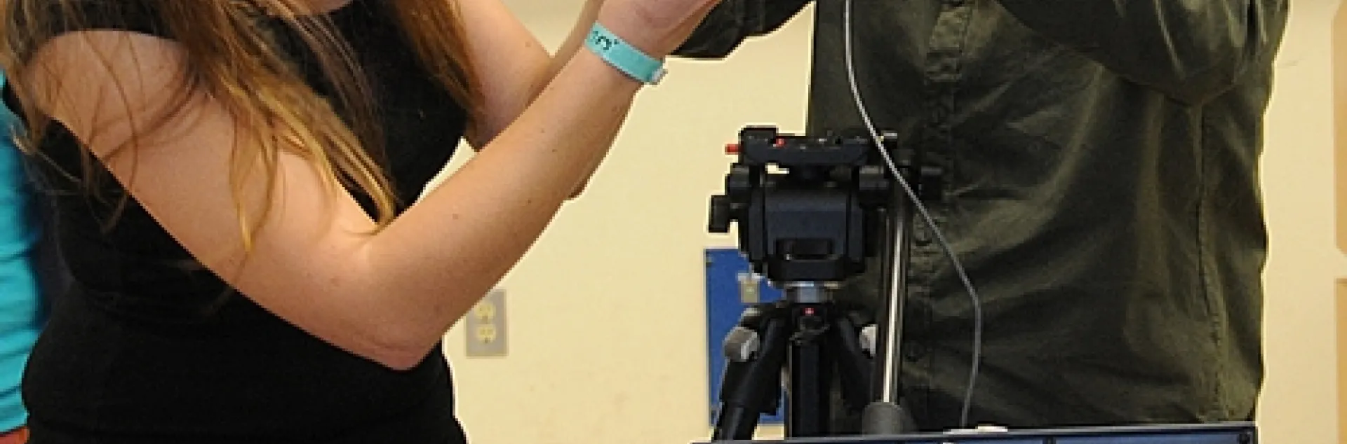 ENTOMOLOGY GRADUATE STUDENTS Amy Morice and James Harwood check out a camera. They were among the students in James R. Carey's class on "How to Make an Insect Collection." The video clips are now posted on the UC Davis Department of Entomology website. (Photo by Kathy Keatley Garvey)