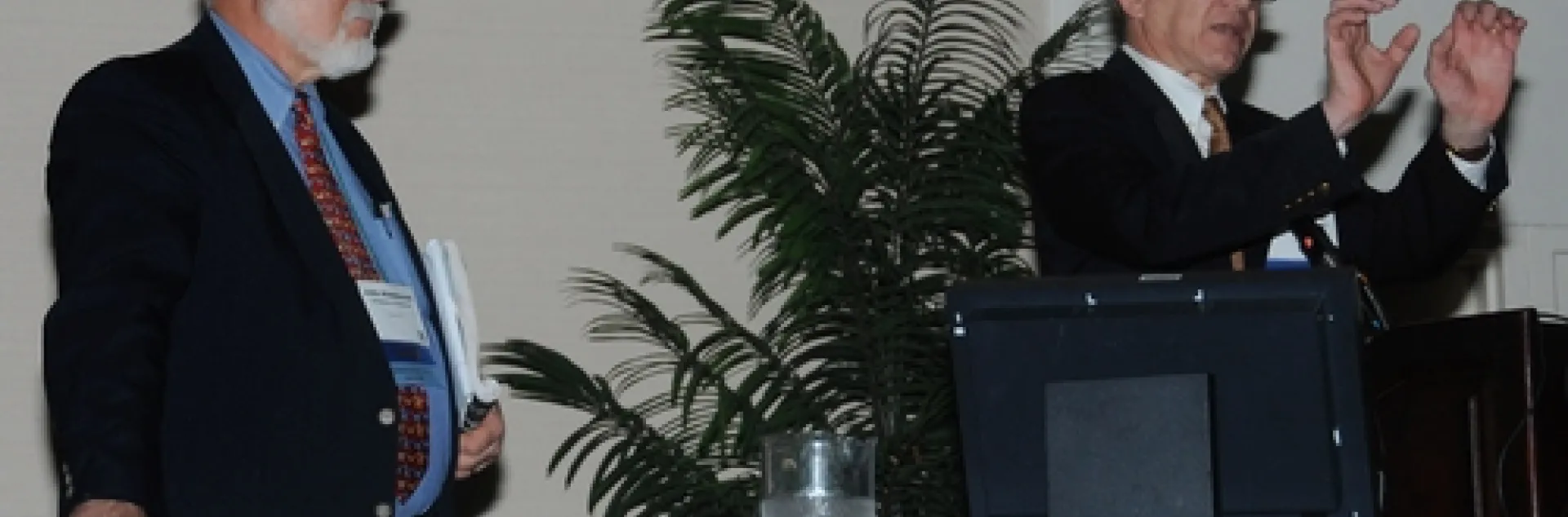 CHEMICAL ECOLOGISTS John Hildebrand (left) of the University of Arizona and Walter Leal of the University of California, Davis, organized and moderated a lively discussion at their seminar at the Entomological Society of America's 58th annual meeting, held recently in San Diego. (Photo by Kathy Keatley Garvey)