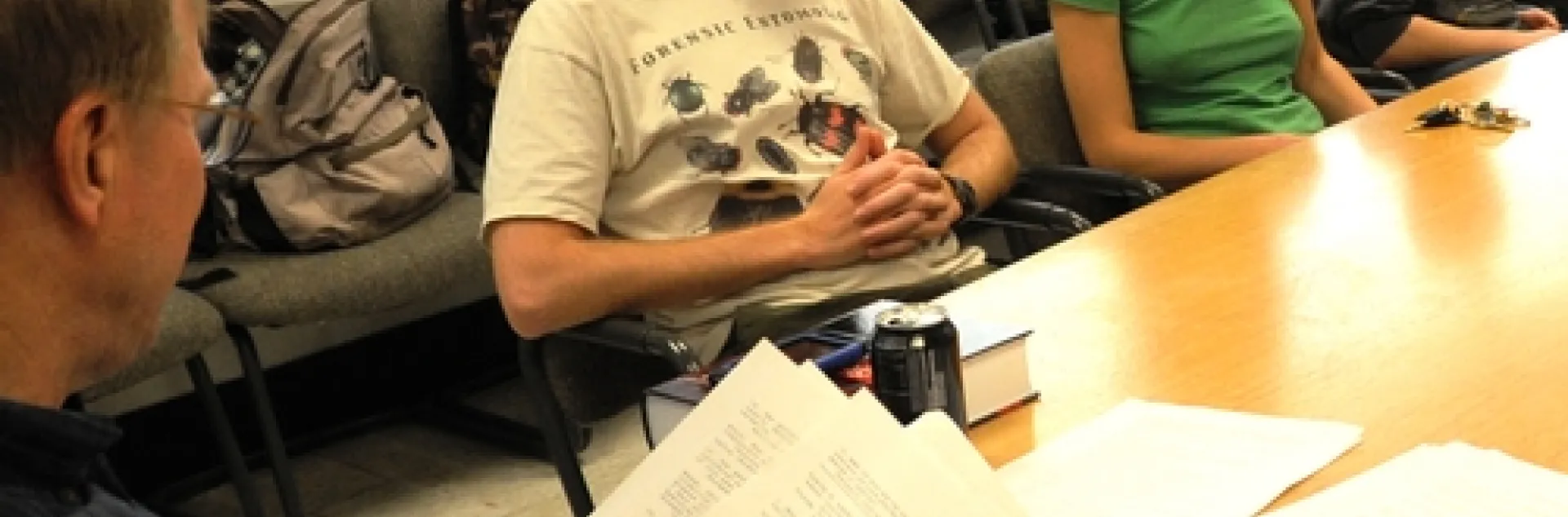 COACH Larry Godfrey, Extension entomologist with the UC Davis Department of Entomology, calls out questions during a practice session. The graduate students (from left) are Matan Shelomi, Meredith Cenzer and Emily Symmes. Not pictured is James Harwood. The team just won the Linnaean Games at the Pacific Branch of the Entomological Society of America and will now compete in the nationals. (Photo by Kathy Keatley Garvey)