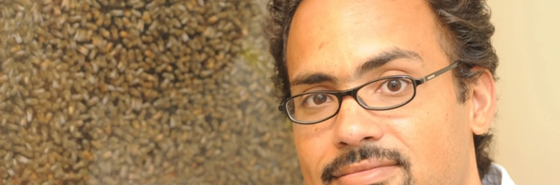 Brian Johnson in front of his bee observation hive. (Photo by Kathy Keatley Garvey)