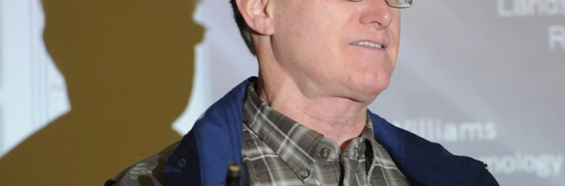 Extension apiculturist Eric Mussen answers questions from a Woodland crowd. (Photo by Kathy Keatley Garvey)