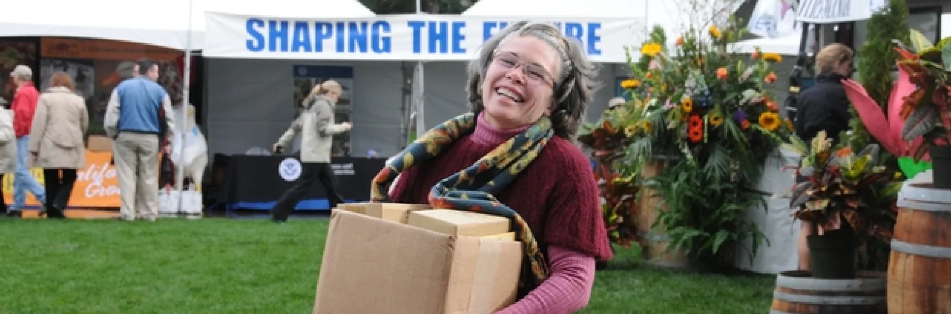 Kathy Kellison, executive director of Partners for Sustainable Pollination, headquartered in Santa Rosa, delivers information to the 2011 beekeepers' booth. (Photo by Kathy Keatley Garvey)