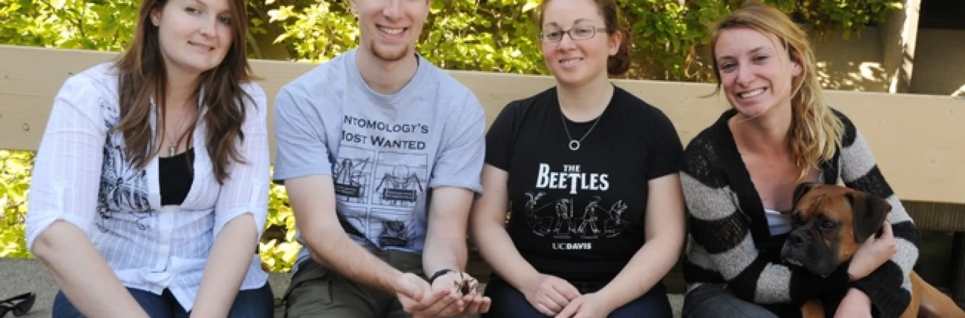 The winning Davis Linnaean Team is comprised of (from left) Kelly Hamby, Matan Shelomi, Kelly Liebman and Jenny Carlson. With them is mascot, Max. (Photo by Kathy Keatley Garvey)