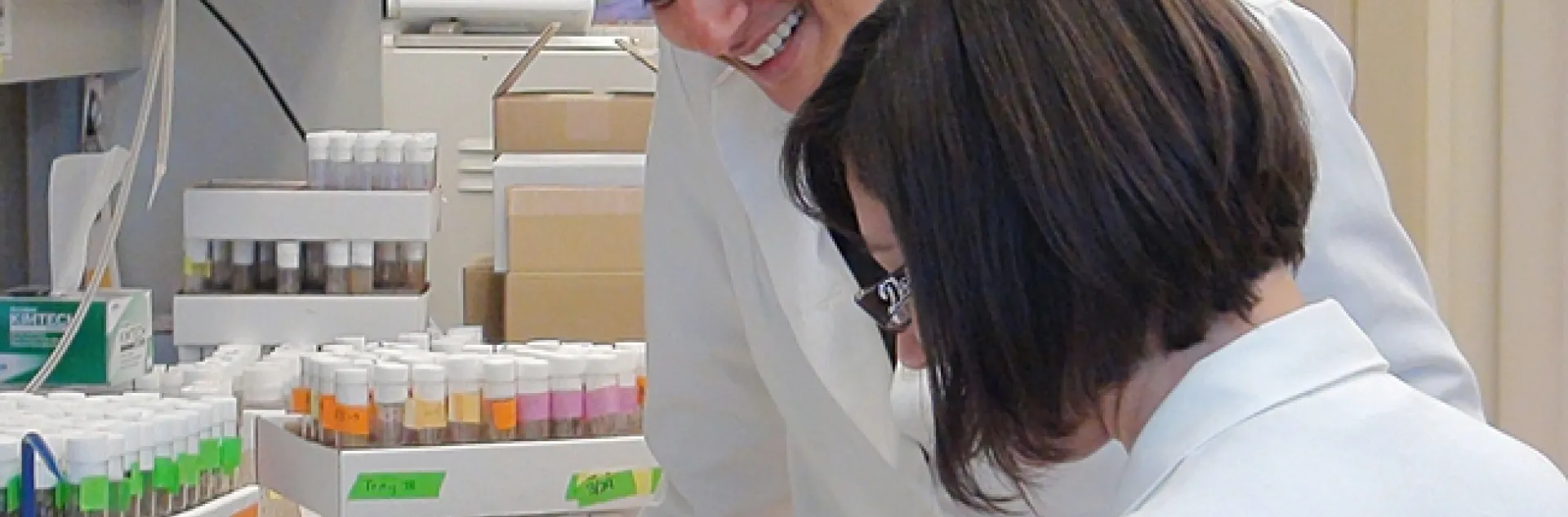 Molecular neurobiologist Anupama Dahanukar of UC Riverside working with Drosophila cultures with junior specialist, Adriana Medina.