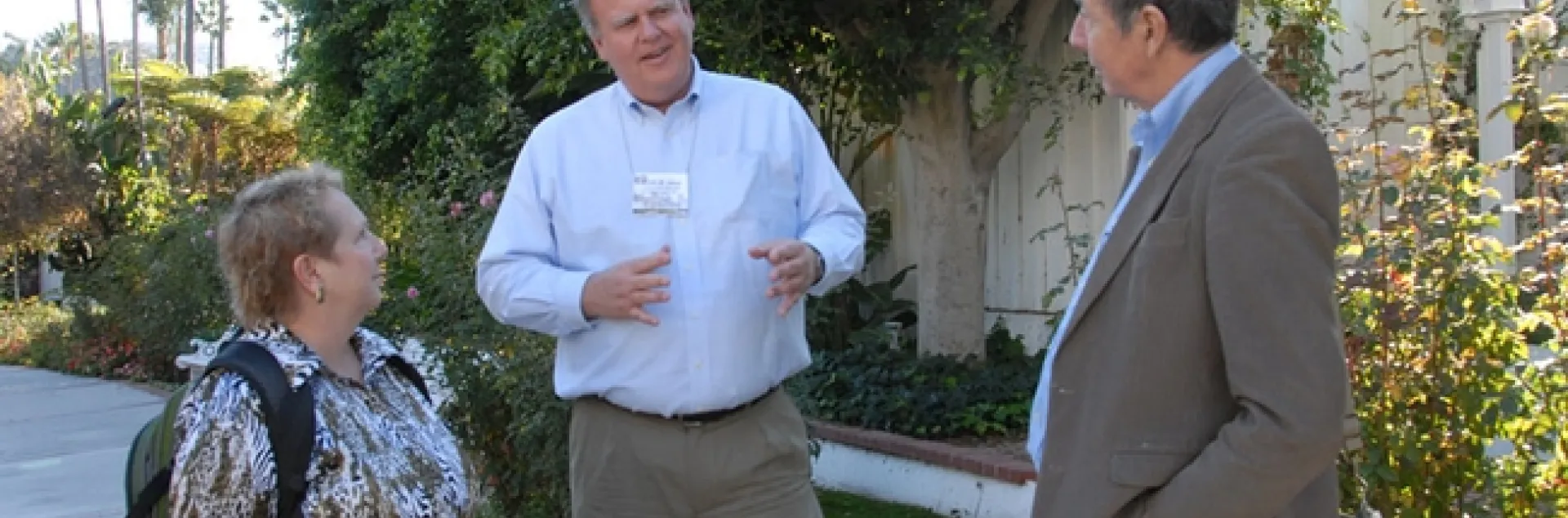 Kelli Hoover of Penn State chats with Kevin Heinz (center) of Texas A&M and Bruce Hammock of UC Davis at a meeting of the Entomological Society of America. (Photo by Kathy Keatley Garvey)