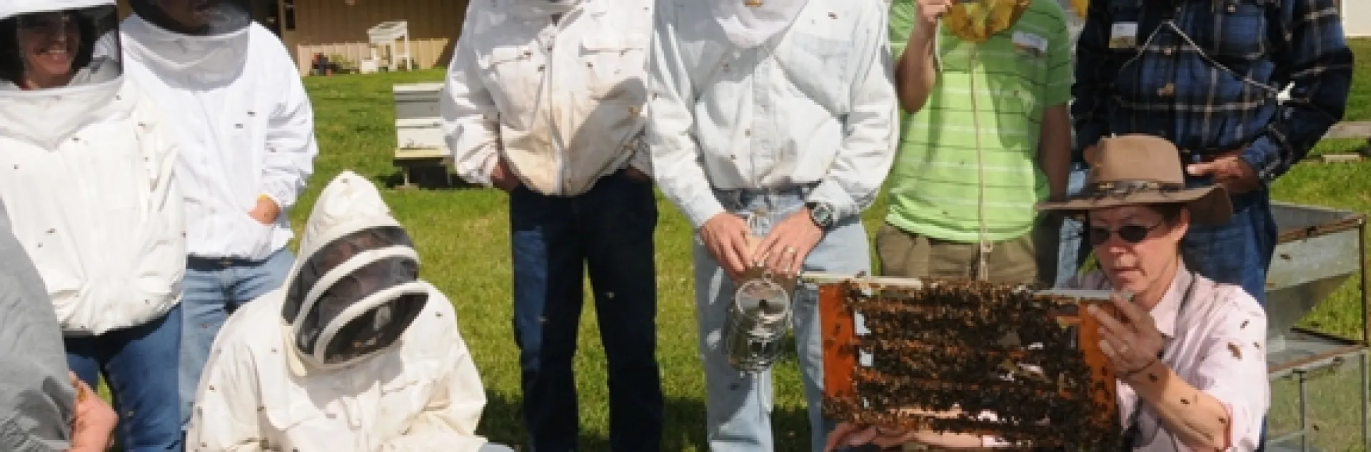 Bee breeder-geneticist Susan Cobey (kneeling at right) at one of her queen bee-rearing classes at UC Davis. (Photo by Kathy Keatley Garvey)