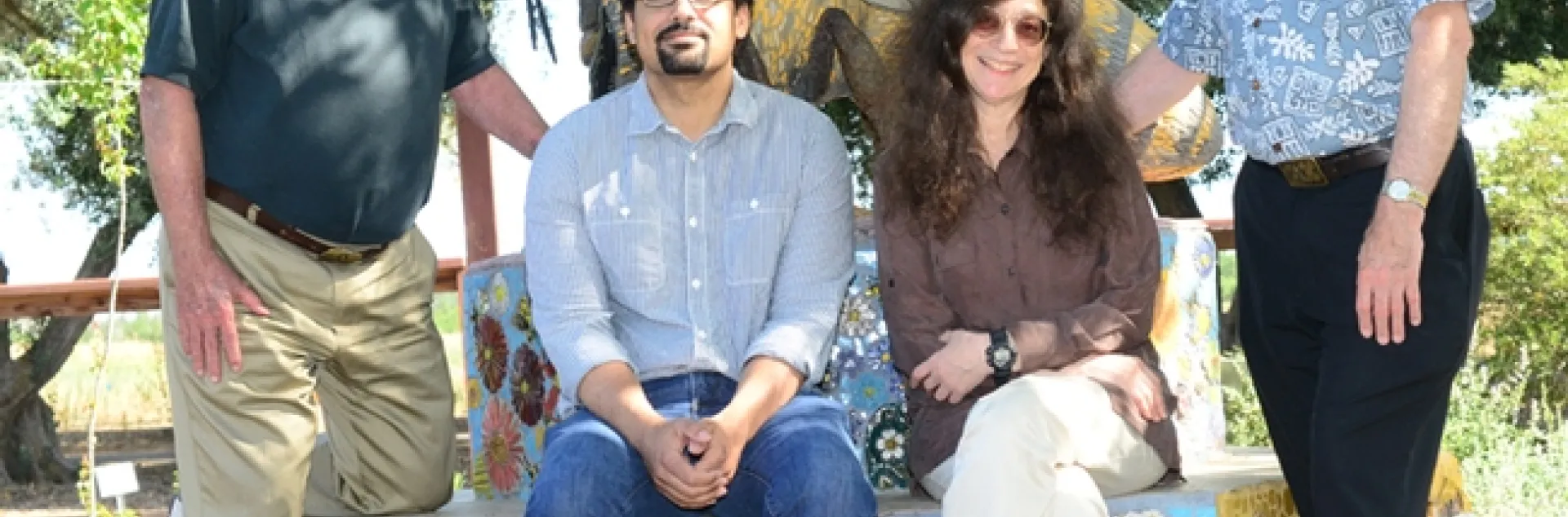 The Bee Team: In front are bee scientist Brian Johnson of UC Davis and May Berenbaum, professor and head of Department of Entomology at the University of Illinois at Urbana-Champaign. In back are native pollinator specialist Robbin Thorp, emeritus professor of entomology, and Extension apiculturist Eric Mussen of UC Davis. The sculpture is by Davis artist Donna Billick. (Photo by Kathy Keatley Garvey)