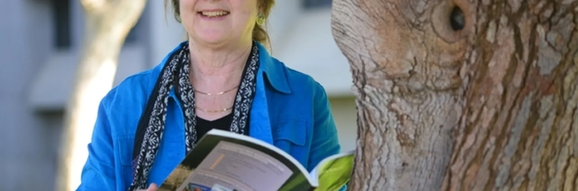 Mary Lou Flint outside her new office at Briggs Hall. (Photo by Kathy Keatley Garvey)