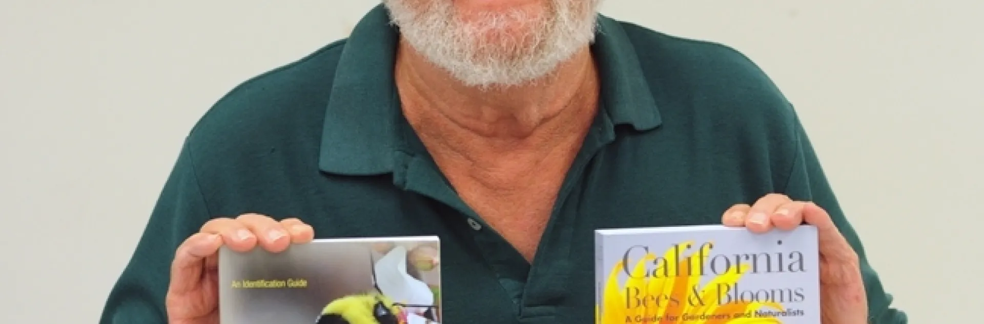 Robbin Thorp with two of the books he co-authored. (Photo by Kathy Keatley Garvey)